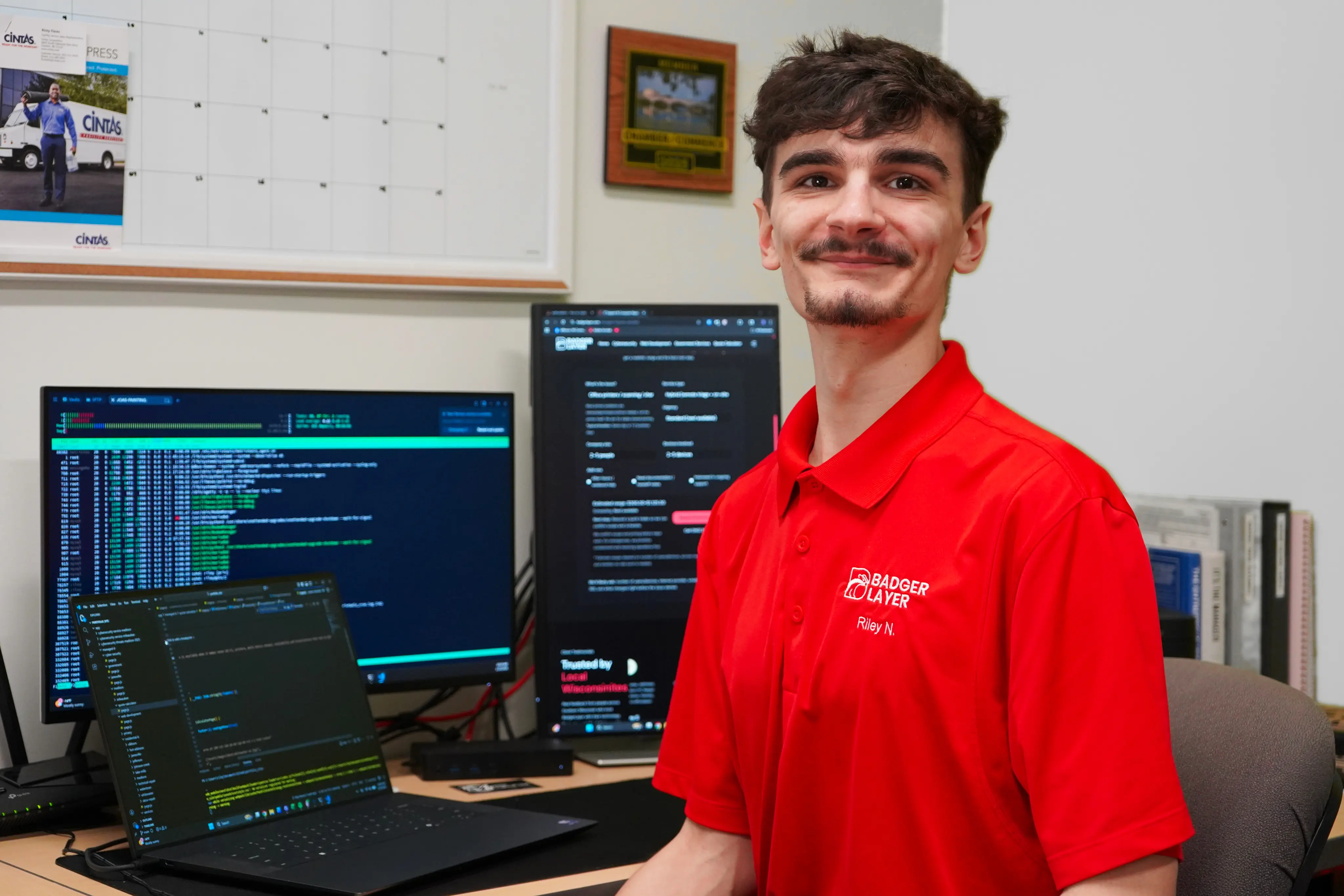 Riley Nevins, founder of BadgerLayer, at the Whitewater office